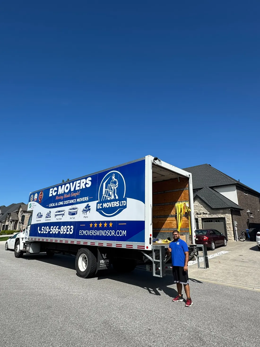 EC Movers truck loading on a Windsor street